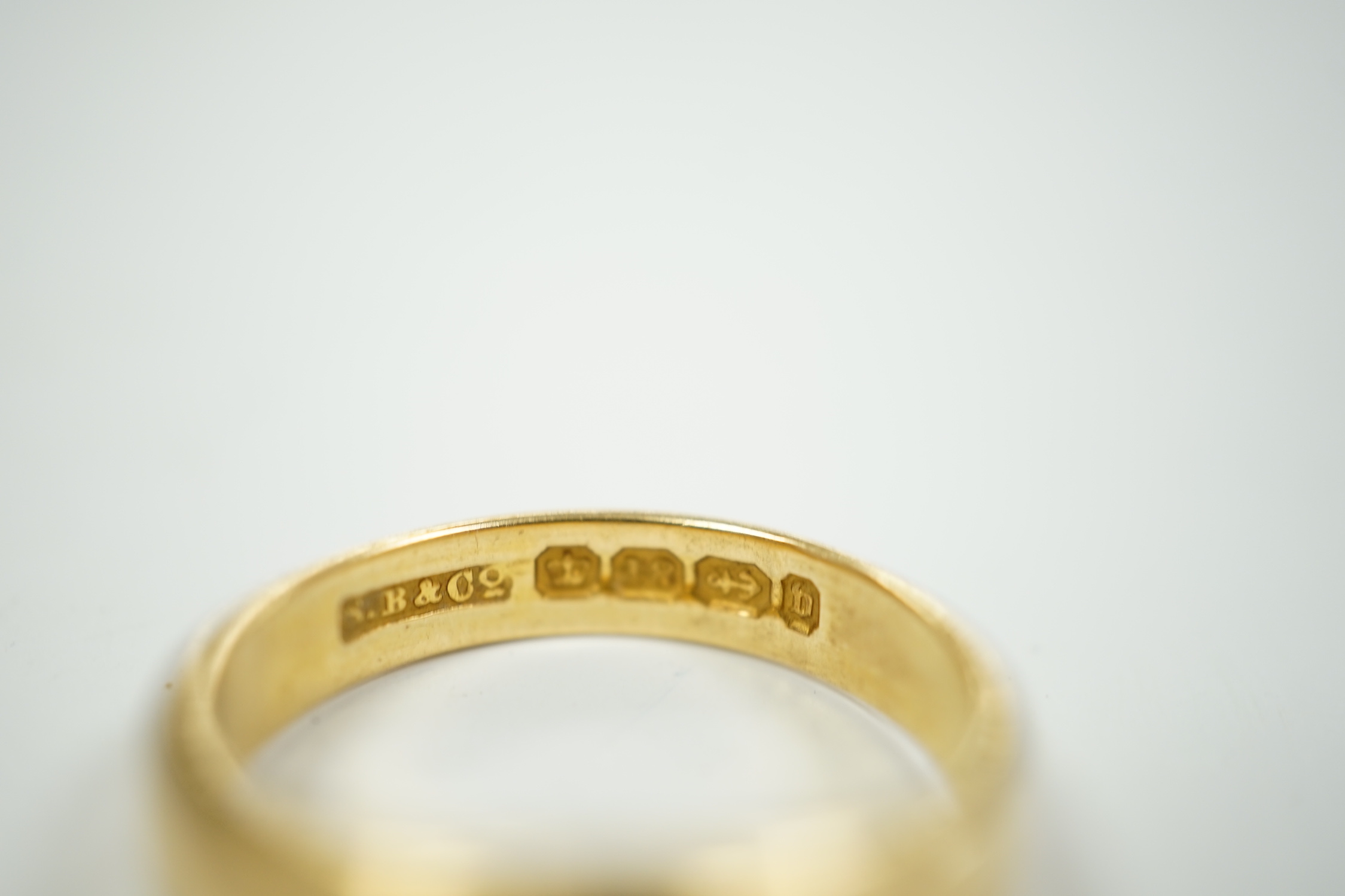 A late Victorian 18ct gold and gypsy set solitaire diamond ring, size Q, gross weight 7.5 grams.